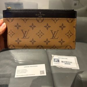 Authentic louis vuitton Slim purse reverse monogram